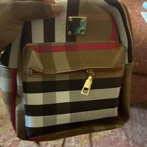 I am selling a small mini bag and it new but with no tag